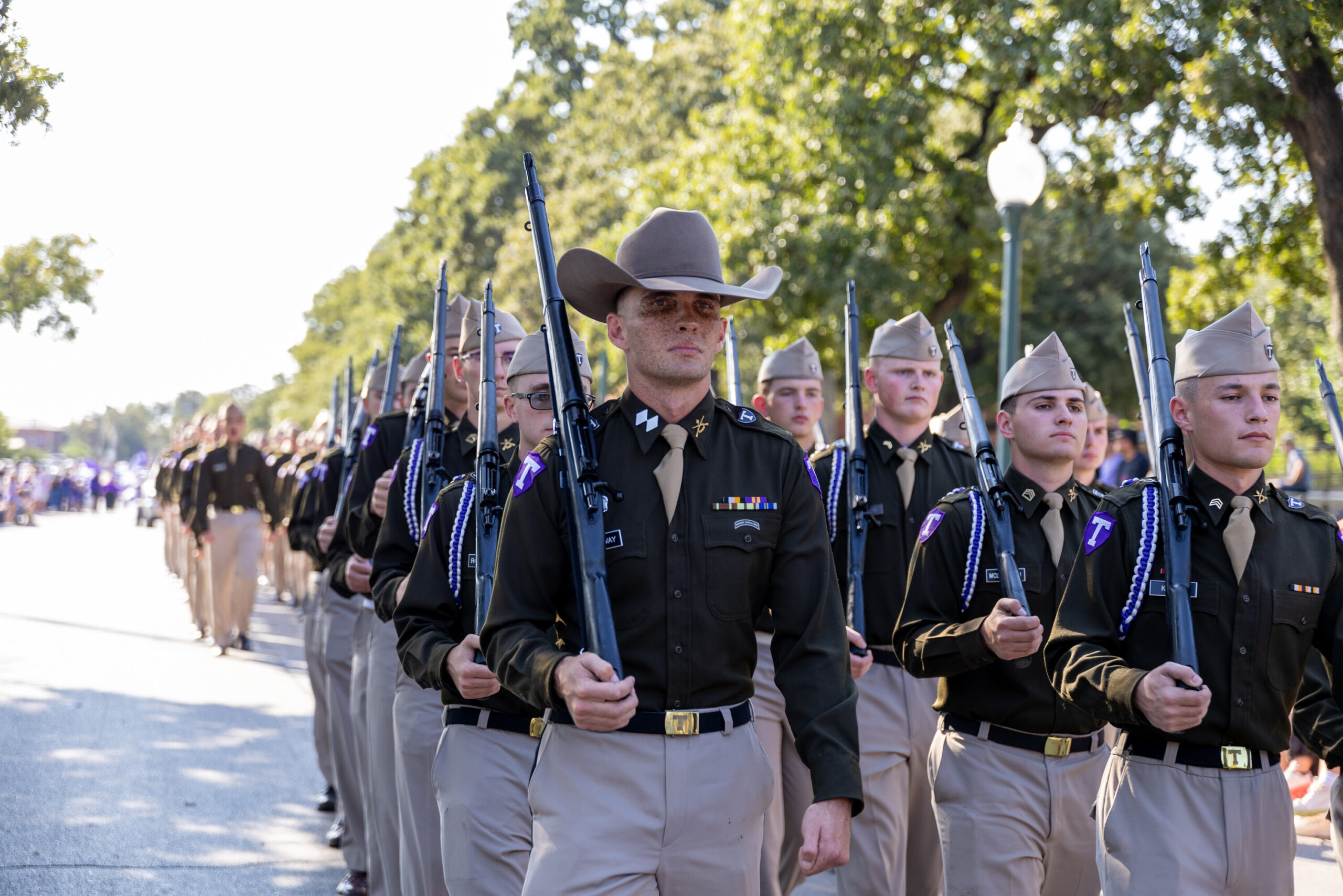 Cadets marching with rifles